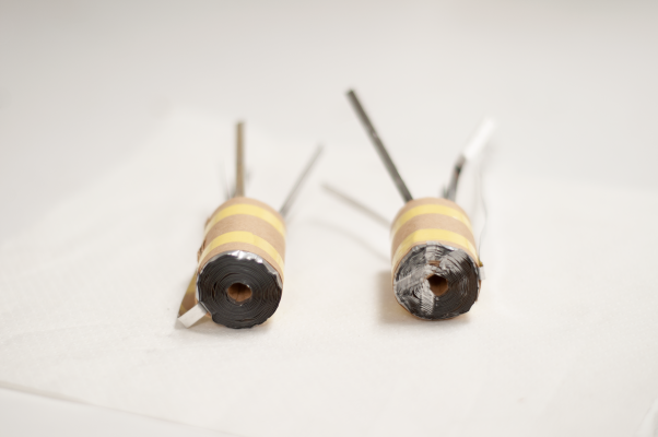 A capacitor winding before and after swaging